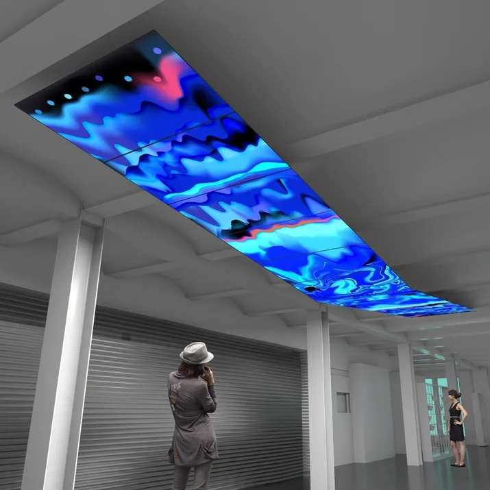 High-res screens mounted above drew attention upward.